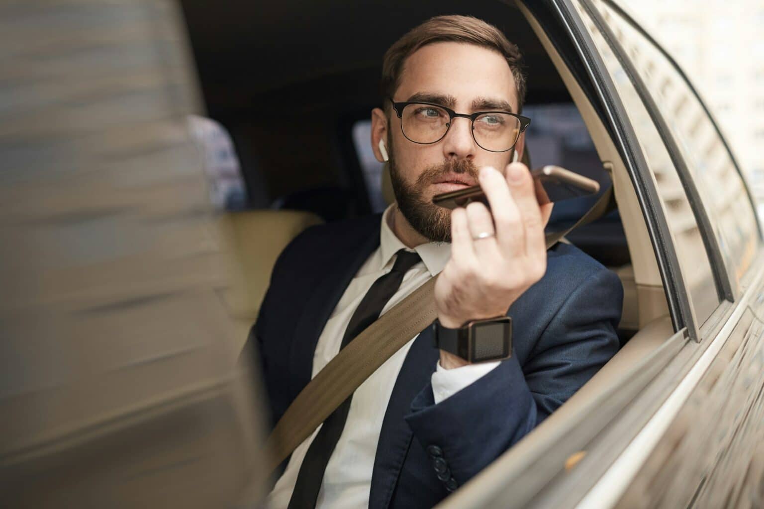 Man recording audio message on the phone