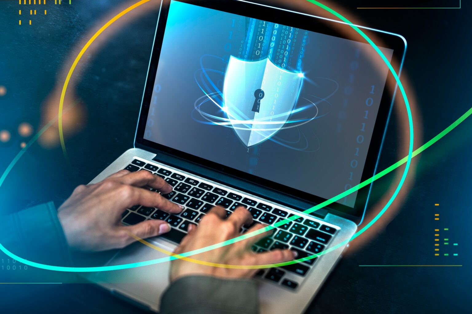 Le meilleur antivirus Mac : un choix crucial pour la sécurité de votre ordinateur Hacker cracking the security code on a laptop