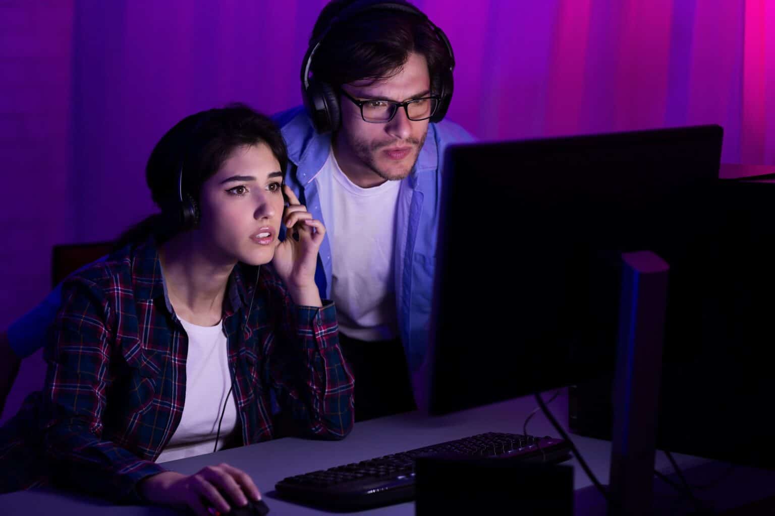 L’Émulation PS5 sur PC : Une Révolution pour les Passionnés de Jeux Vidéo Gamers playing PC video game on eSport tournament