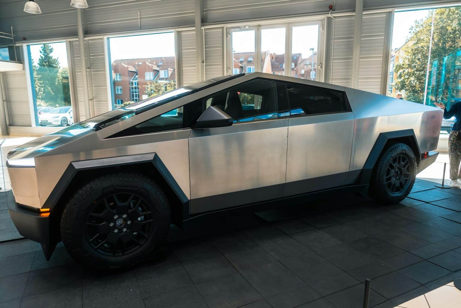 A futuristic car parked inside of a building