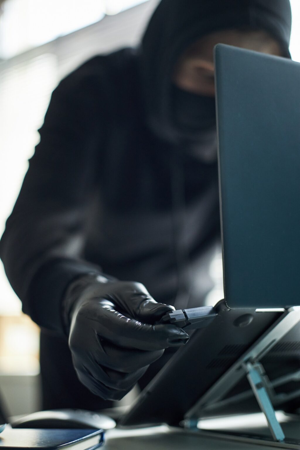 Unrecognizable Man Hacking Computer System Using Malware on Usb Device